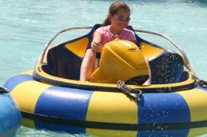 A child in a bumper boat